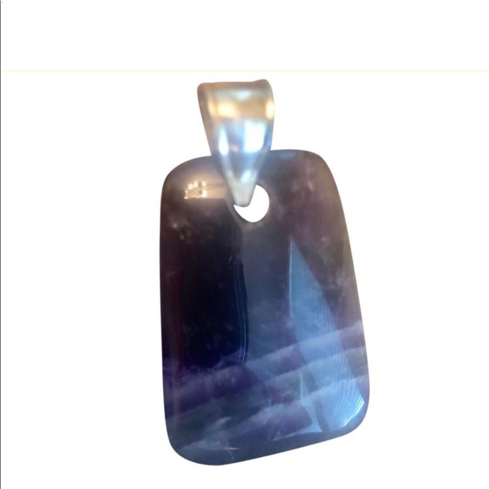 Silver and amethyst pendant